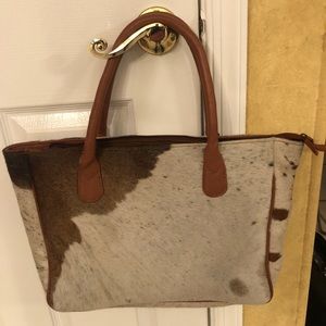 Vintage real cow hide tote. Like new, no stains in or out.